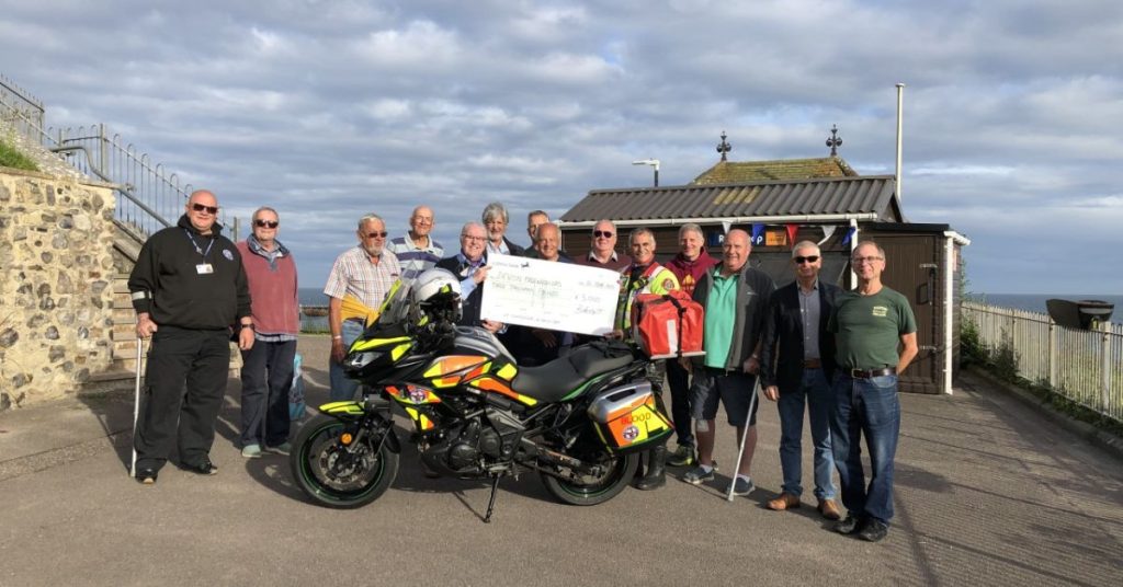 Buffs of Beer raise £3,000 for Devon Freewheelers - recognising the charity's 'vital service supporting the NHS'